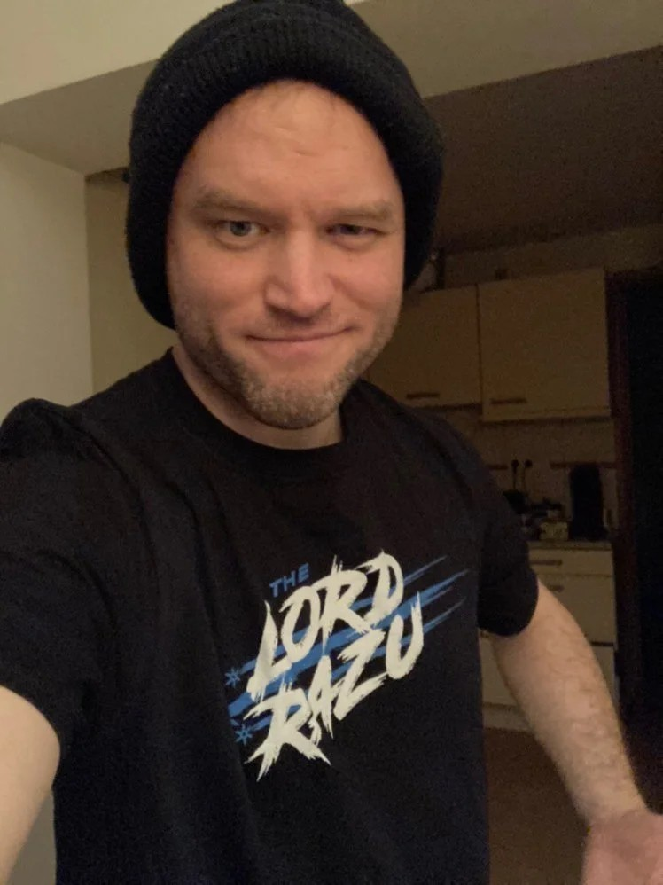 The Lord Razu community wearing archive merch