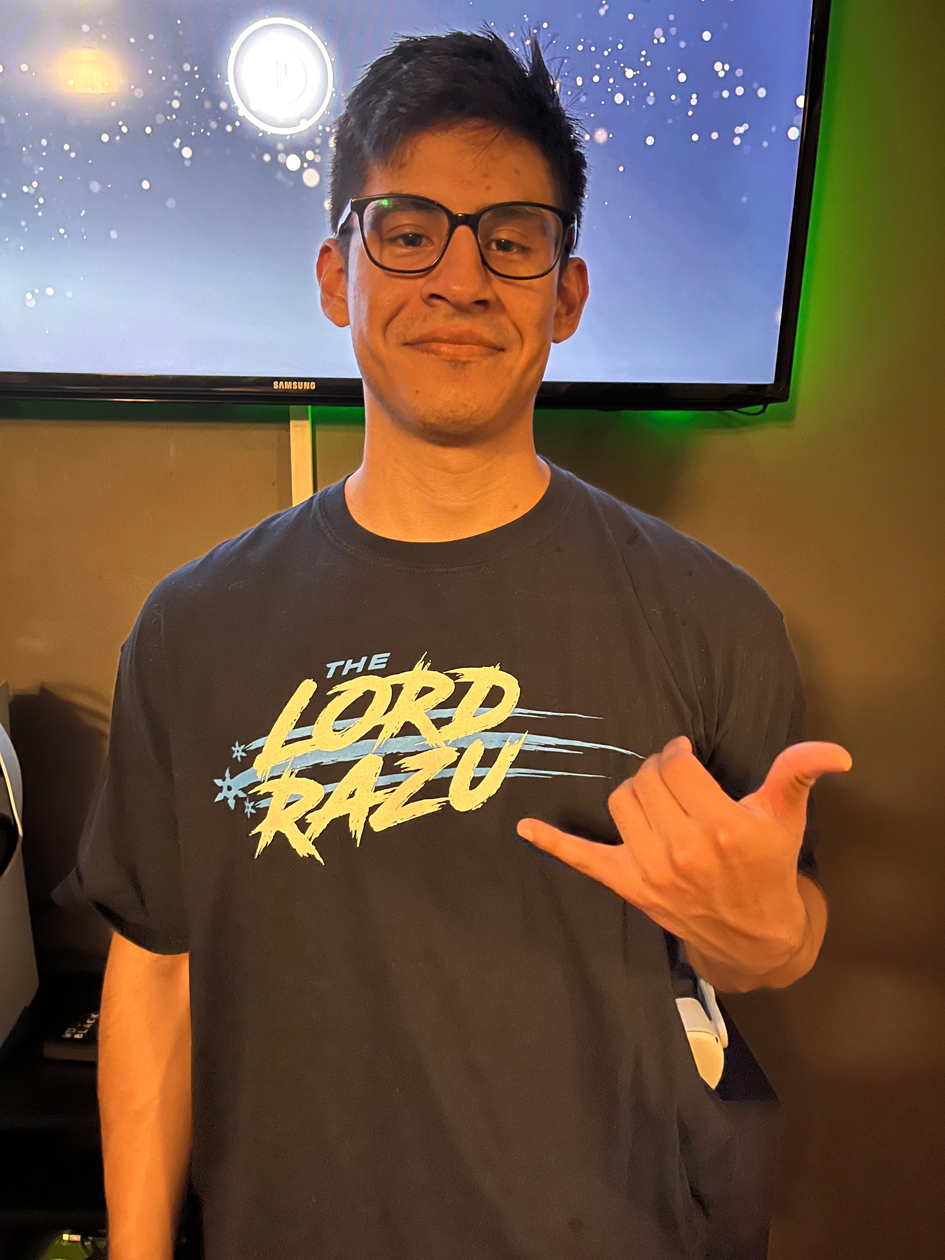 The Lord Razu community wearing archive merch