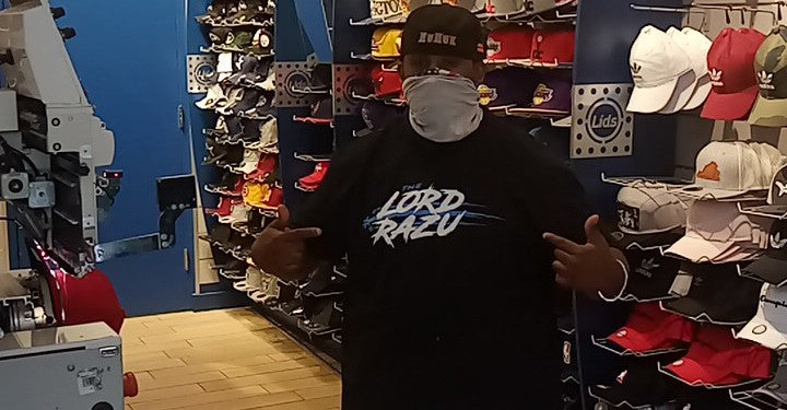 The Lord Razu community wearing archive merch