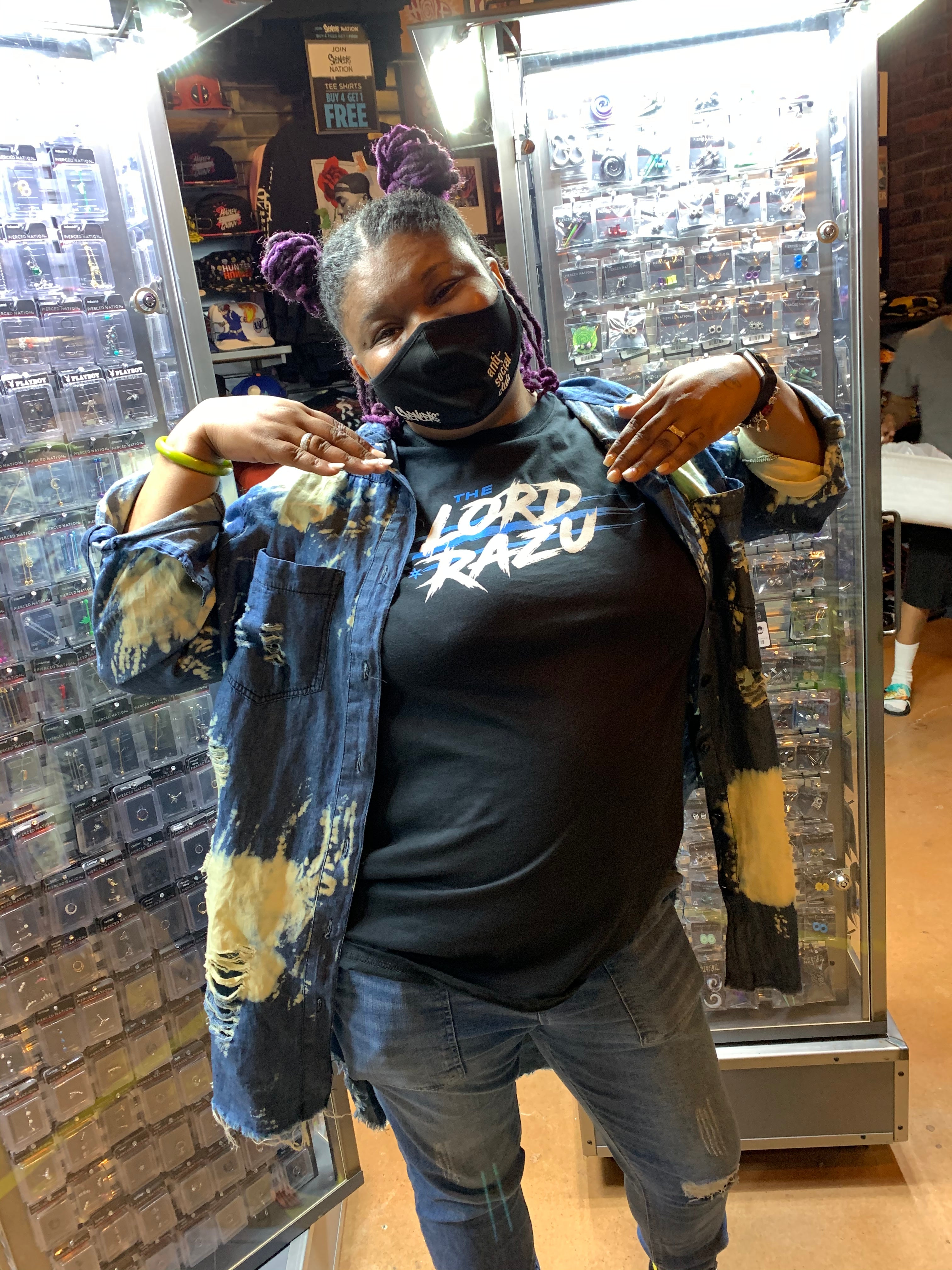 The Lord Razu community wearing archive merch