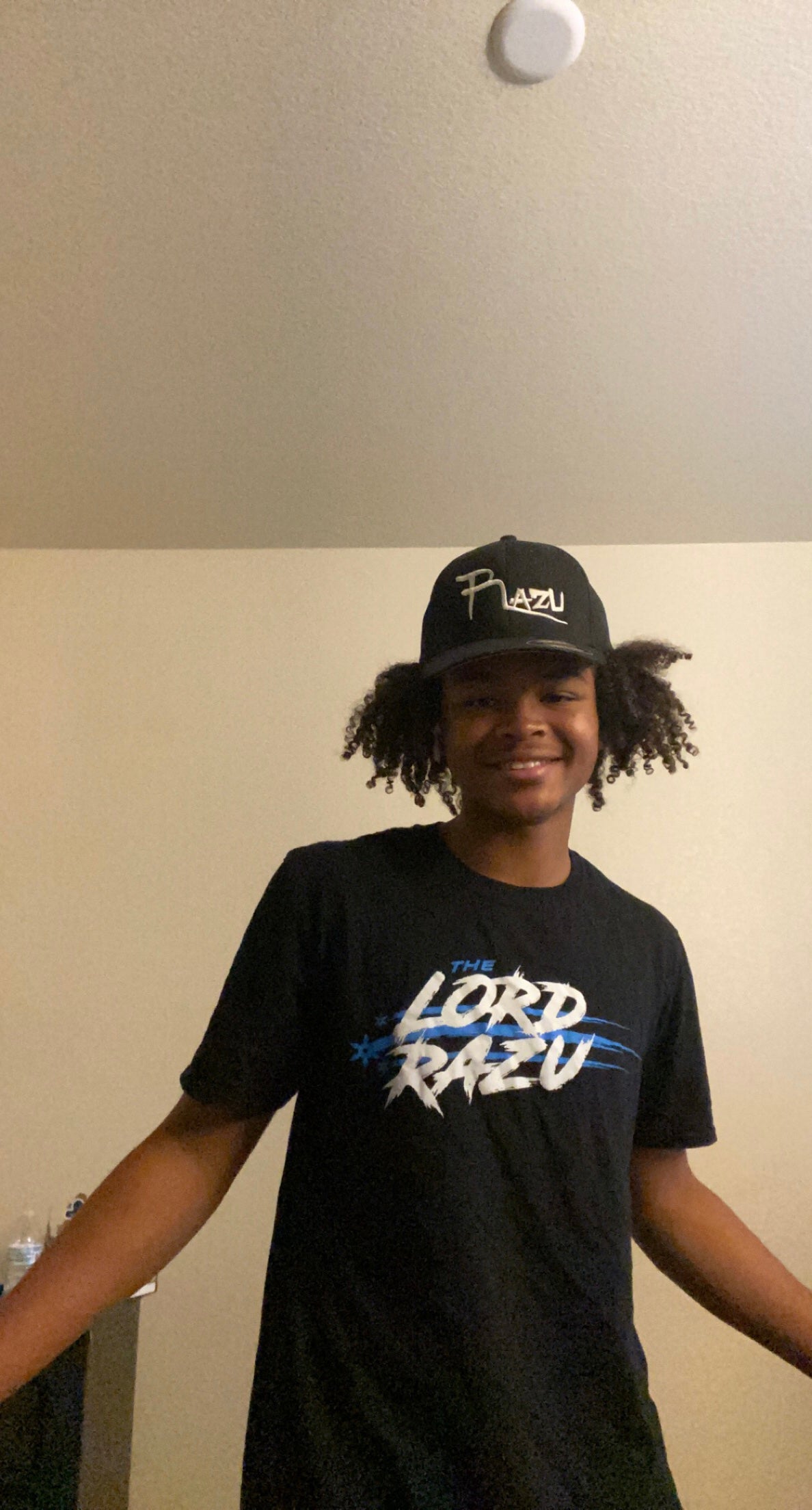 The Lord Razu community wearing archive merch
