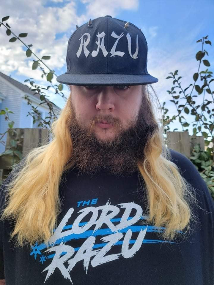 The Lord Razu community wearing archive merch